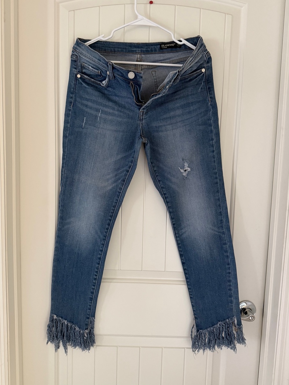 Blank NYC Medium Blue Distressed Cropped Jeans with Frayed Ankles